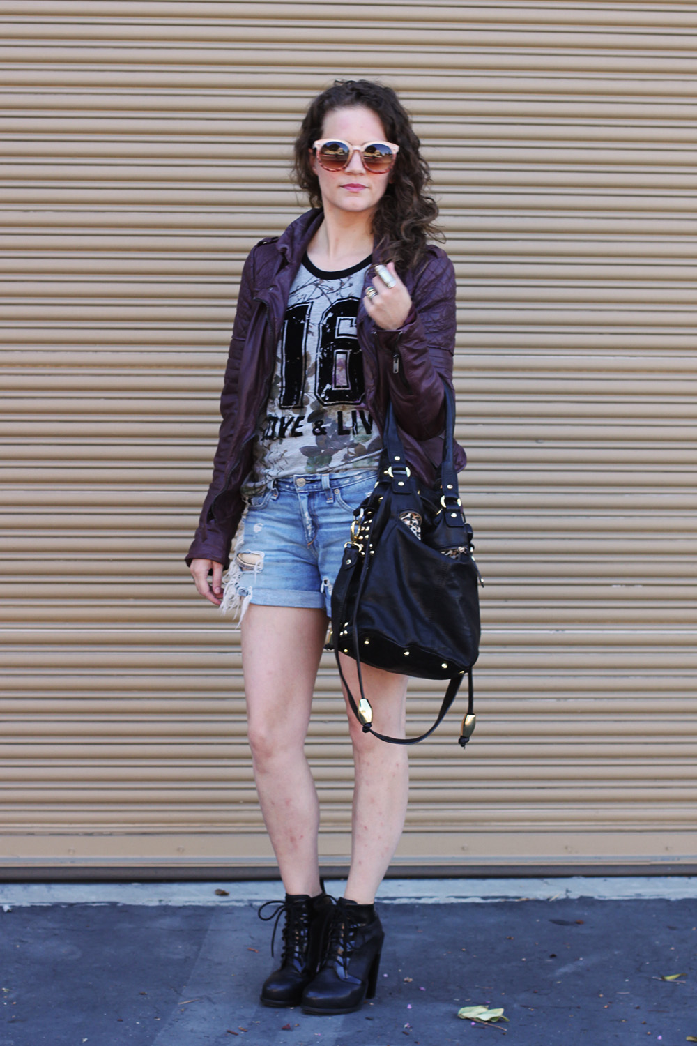pairing shorts with boots for summer on undeniablestyle.com